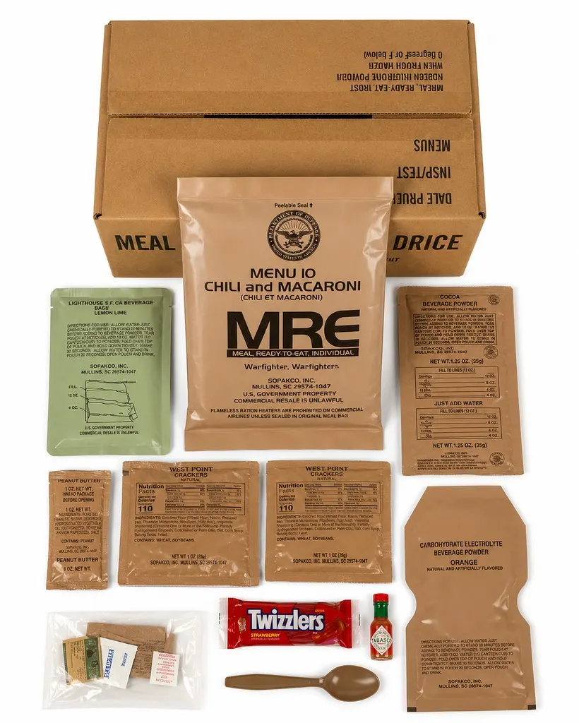 Full MRE meal contents splayed out: entrée, crackers, peanut butter, beverage powders, snack, Tabasco, and spoon